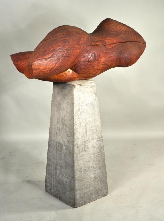 Carved Wooden Modernist Sculpture, Female Torso: Striking organic carved hardwood modernist sculpture of a reclining female torso, by anonymous artist, mounted on an inverse tapered concrete pedestal, from the Estate of Georgiana Ducas, Saratoga NY.