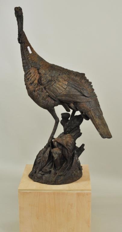 W. Matia, Bronze Sculpture "Standing Turkey": Walter Matia (American b. 1953) naturalistic bronze sculpture of "Standing Turkey with Jack-in-the-Pulpit", signed on leaf on base "Matia 12/20" 43 1/4" high, 28" wide, 12" deep. This edition is sold 