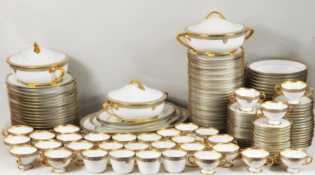 Dresden Porcelain Partial Dinner Service: Dresden porcelain partial dinner service, 20th century, with gilt leaf and berry banded decoration on a pale blue ground, with monogram. Comprising: 17 dinner plates, 30 salad plates, 18 soup bowls, 3