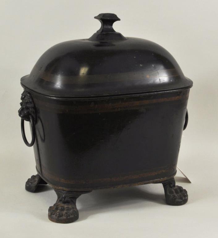 Regency Period Tole Coal Bin, Sarcophagus Form: Regency period painted toleware coal bin, of sarcophagus form, with lion mask ring handles and paw feet. 15" high, 14" wide, 10 1/2" deep.