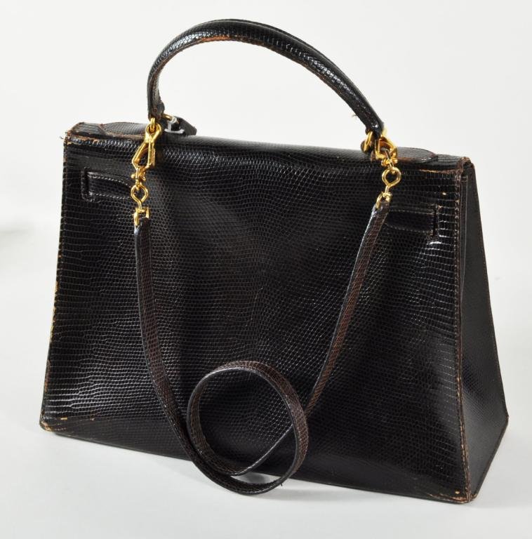 Vintage Hermes Brown Lizard Kelly Handbag: Vintage Hermes brown lizard Kelly bag, with lock, key and shoulder strap. Extensive use wear, key case detached. 9" high, 12" wide