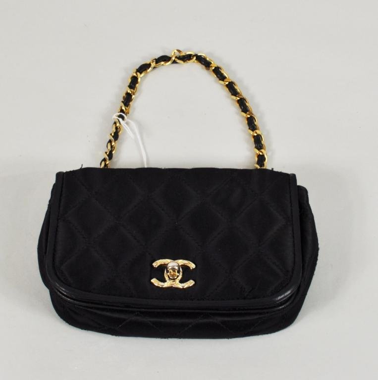 Chanel Quilted Satin Evening Bag, 20th C.: Chanel quilted satin evening bag, 20th century. 6 5/8" long, 4 5/8" wide