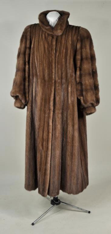 Full Length Revillon Designer Mink Coat: Full length designer mink coat labeled "Revillon, Paris-New York", size medium, original cost over $15,000, and in like new condition.