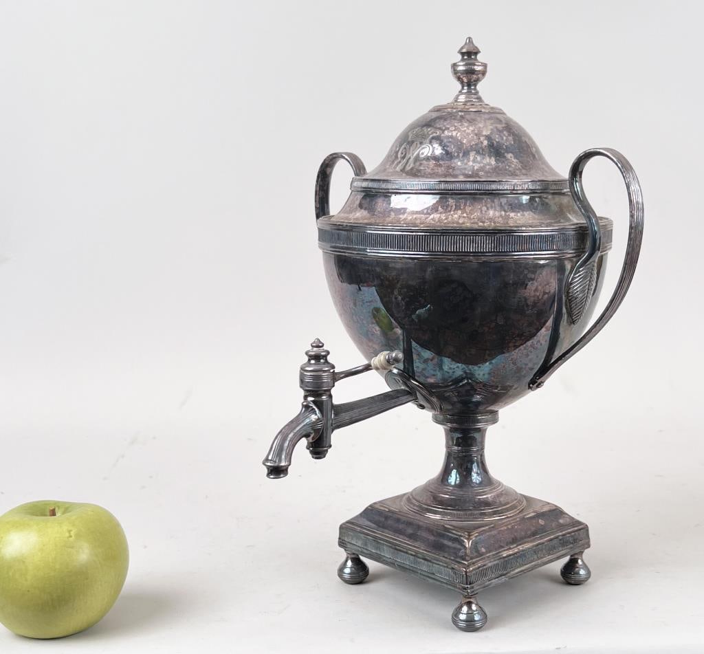 Old Sheffield Lidded Hot Water Urn: ovoid form with stylized "W" mounted with crown. Early 19th century. 12 1/2" high, 10" wide, 10" deep. Oxidation, use wear.