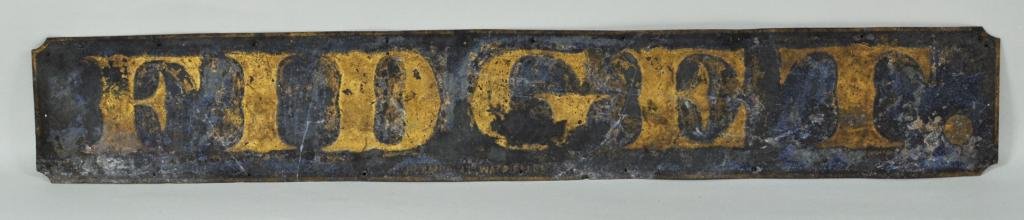 Gilt Lettered Zinc Sign "Fidget": Gilt lettered zinc sign "Fidget" in smaller letters below J. Campbell Waco Falls, also in pencil on reverse J. Campbell Waco Falls, perhaps a sign on a horse's stall, 19th C. 4 3/4" high, 30" long Con