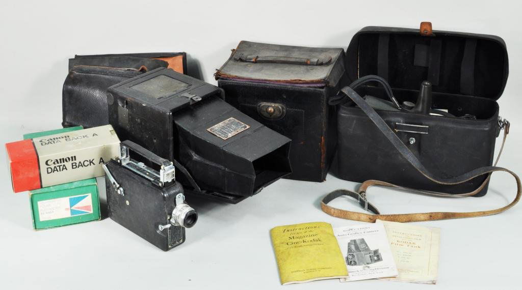 Three Vintage Cameras: Three vintage cameras, 20th C., including an auto graflex camera, a magazine cine Kodak, and a compensating polar planimeter made by Keuffel & Esser, Morristown, NJ and other items. Largest: 7 1/2" hi