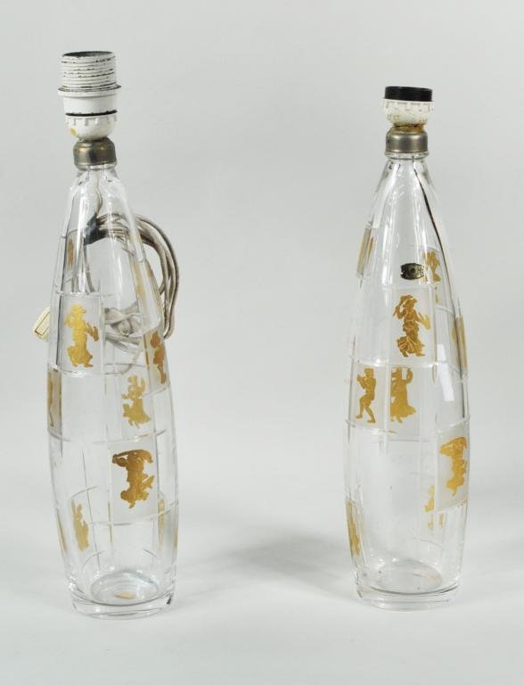 Pair Belgian Val St. Lambert Glass Vase Form Lamps: Pair of Belgian Val St. Lambert glass vase form lamps, 20th C, with etched and gilded figural and floral decoration. 16" high, 3 3/4" diameter Condition: a couple tiny base chips, small area of gilt l
