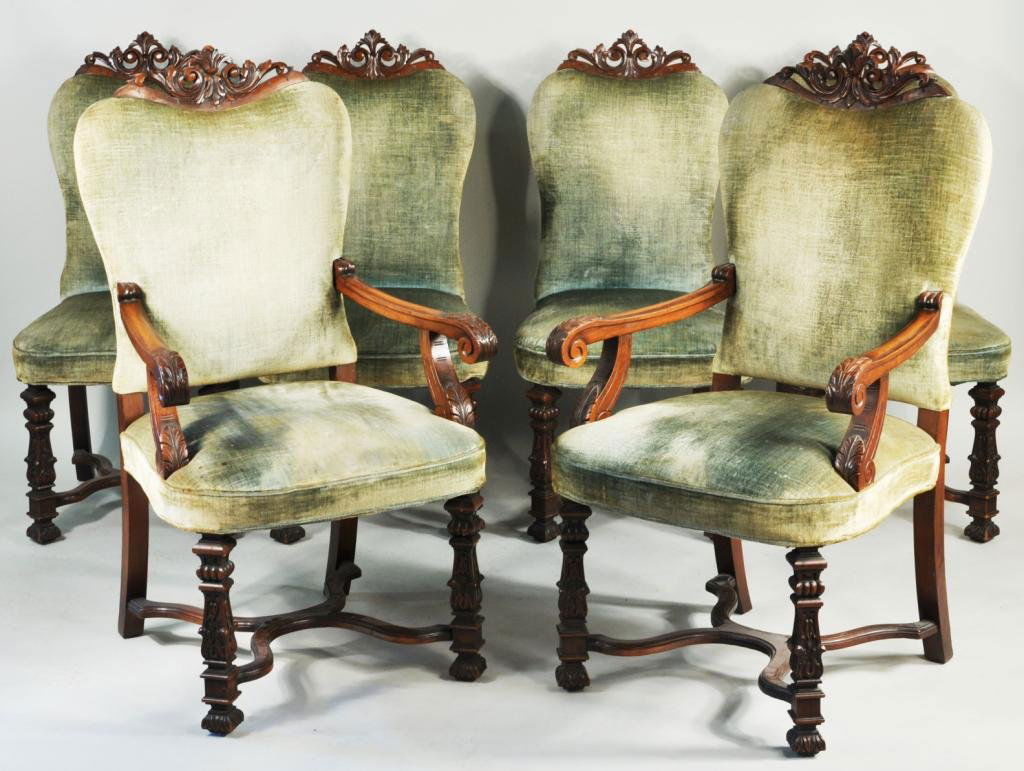 Set Six Spanish Colonial Style Dining Chairs: Set of six Spanish Colonial style dining chairs, 20th C., comprising two arm and four side, chairs with pierce carved top, acanthus carved arms over carved legs and "X" form stretcher base. Largest: 4