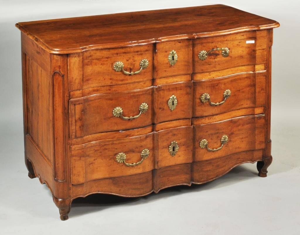 Louis XV Walnut Provincial Commode: Period Louis XV walnut provincial commode, with shaped drawer fronts and foliate hardware. Some restorations and repairs. 32 1/2" high, 49 1/2" wide, 24 1/4" deep.