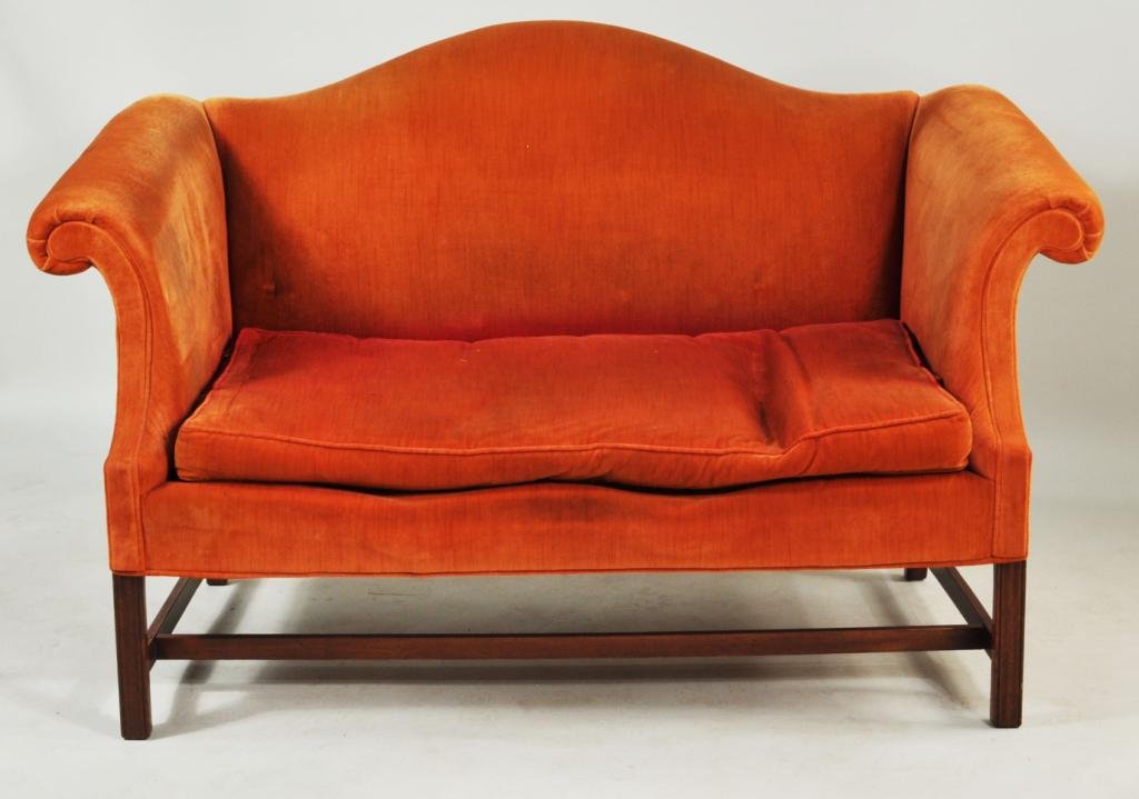Chippendale Style Mahogany Upholstered Settee: Chippendale style mahogany upholstered camelback settee, in orange upholstery on square molded front legs. 35" high, 58 1/4" wide, 34" deep.