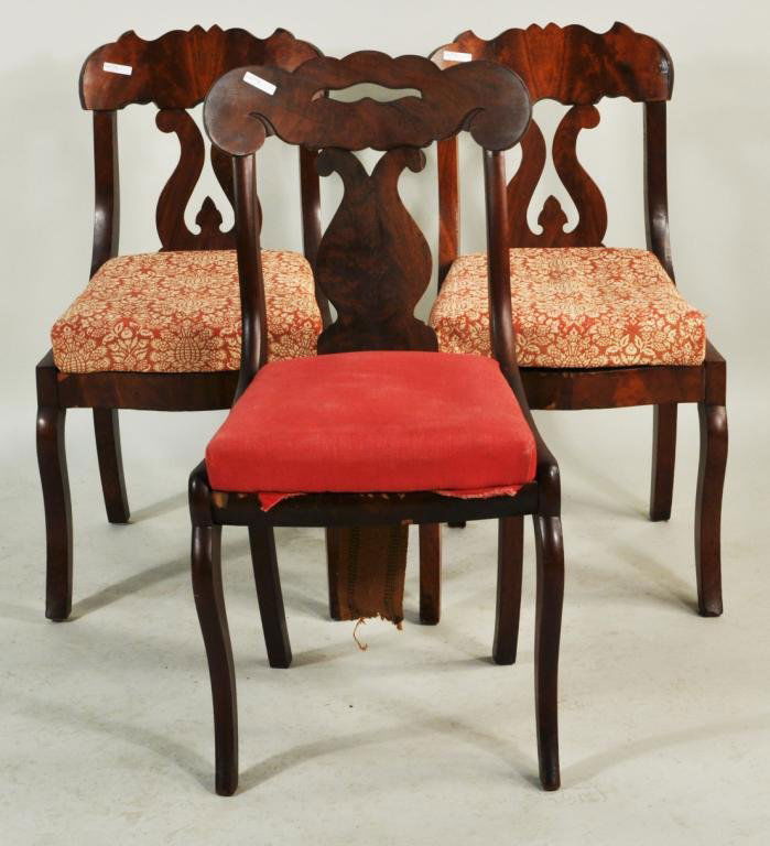 Pair Empire Mahogany Side Chairs, Plus One: Pair of American Empire mahogany side chairs, with lyre form back splats and shaped crests, together with a single mahogany Empire side chair with pierced crest. Largest: 33" high, 17 1/2" wide, 18" d