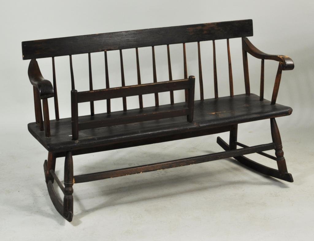 Windsor Country Painted Rocking Cradle: American windsor country rocking cradle in black paint. 28 1/2" high, 48 1/2" wide, 25" deep. Condition: use wear, losses, repairs.