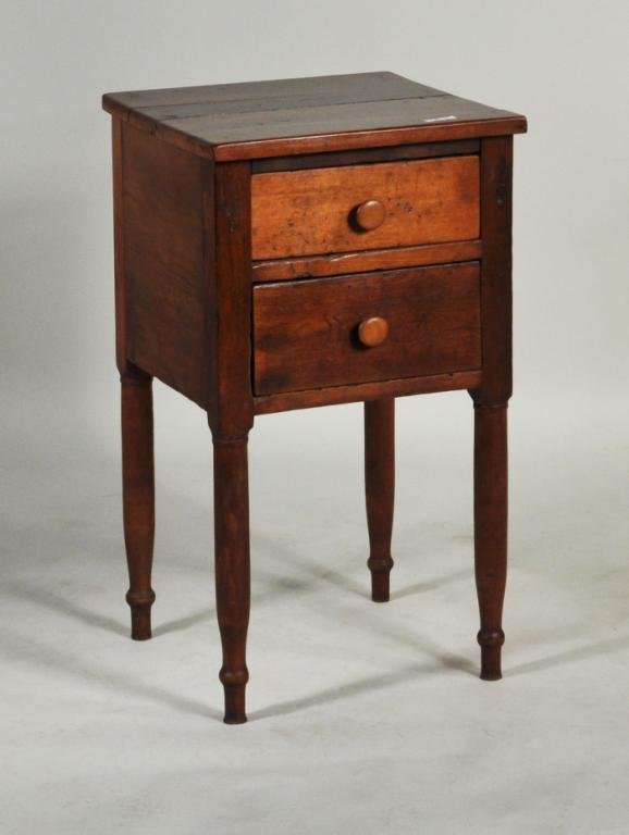 American Country Sheraton Two Drawer Bedside Table: American country Sheraton two drawer bedside table, with knob pulls and turned legs. 29 1/4" high, 16" wide, 16 1/4" deep.