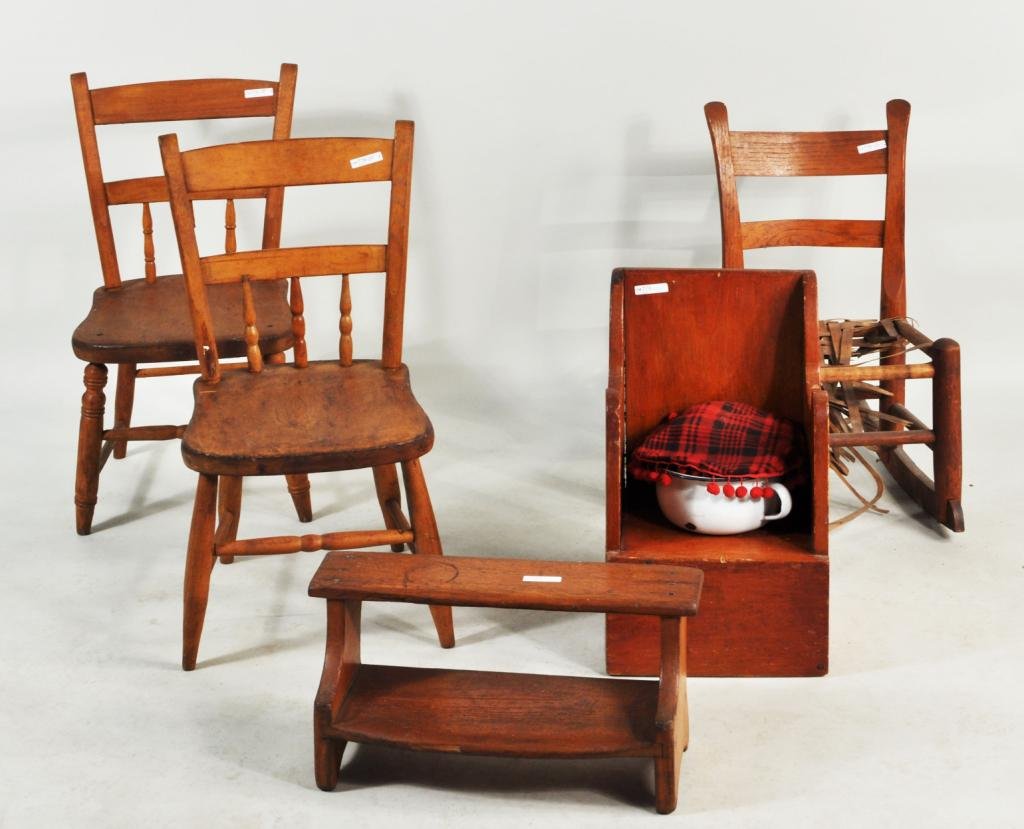 Four Childrens' Chairs & A Step Stool: Four children's' chair and a step stool, 19th C., comprising two plank seat chairs, a rush seat rocker, and a potty chair. Largest: 27" high, 14" wide, 11 1/4" deep; potty chair: 19" high, 11" wide, 1