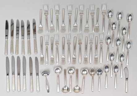 Towle Sterling Partial Flatware Service: in "Old Lace" pattern. Comprising: twelve salad forks, eleven dinner forks, eleven teaspoons, four soup spoons, one small ladle, a sugar spoon, a jam spoon, twelve sterling handles dinner knives and o