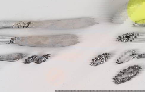 Group Georg Jensen Sterling Wares: including Cactus & Acorn fish knives, dove brooch and earrings, bottle opener and fish brooch. Acorn knife: 10 1/2" long. Weighable silver: 1.045 OZT. Oxidation, use wear. *No credit card payments wil