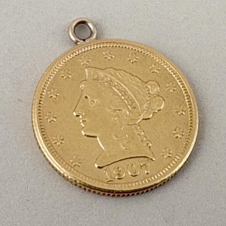 1907 Liberty Head 2.5 Dollar Gold Coin: US quarter eagle, ungraded, ex-jewelry with mount. *No credit card payments will be accepted for silver, gold, coins or jewelry from buyers that have not purchased from our gallery in the past.
