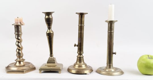 Four Antique Brass Candlesticks