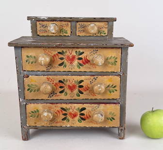 Vintage Late Federal Style Painted Miniature Chest: with Pennsylvania Dutch style heart design. 12" high, 11 1/4" wide, 6 1/8" deep. Paint losses, wear. Property from the Estate of Bobbie Hainline Howrey.