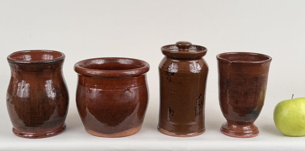 Group Four Redware Jars: 20th century, including examples by G. Wolff, Pied Potter, and Old Sturbridge. Largest: 7" high, 4" diameter.