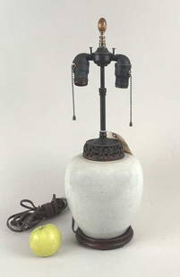 White Porcelain Chinese Vase, As Lamp: fitted with openwork carved wood lid and wooden base. Vase: 10 1/2" high, 7 1/2" diameter; overall lamp 21" high. Soiling.