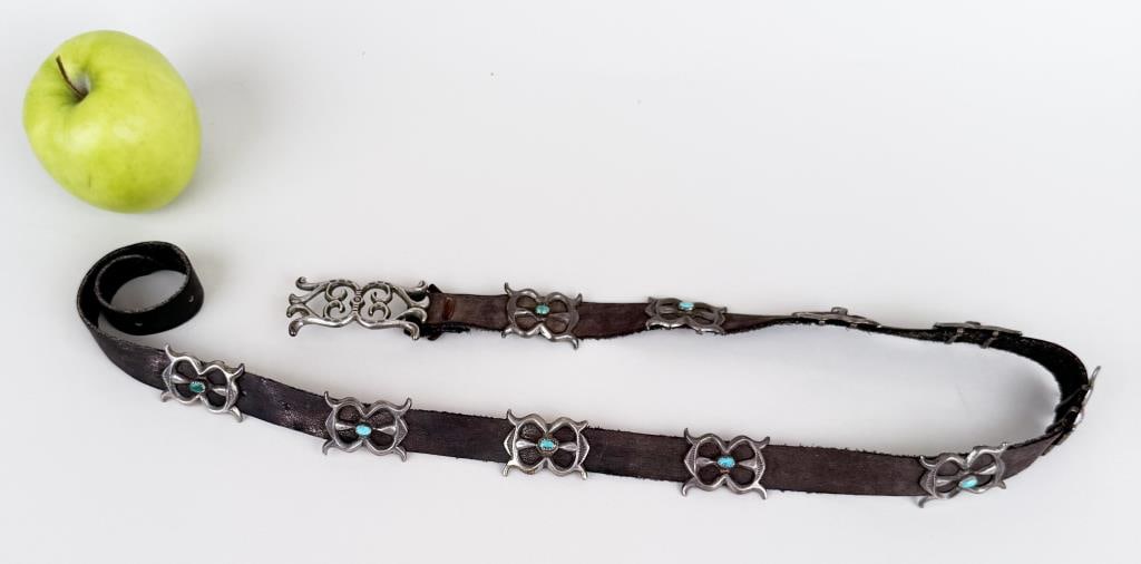 Native American Concho Belt: with serpentine silver mounts. 39" long, 1" wide. Wear to leather, oxidation. Property from the Estate of Bobbie Hainline Howrey.