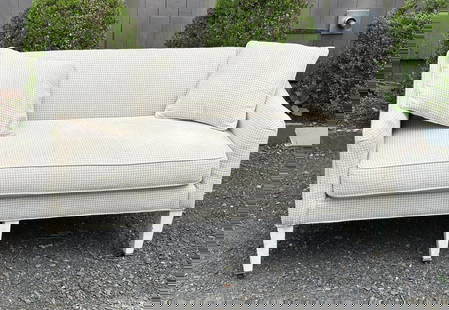 Vintage White Painted Country Upholstered Sofa: with curving arms rests, white painted square tapering wooden legs with casters. 29 1/2" high, 53" long, 27" deep. Some wear, soiling, a couple stains to upholstery, scuffs to frame.