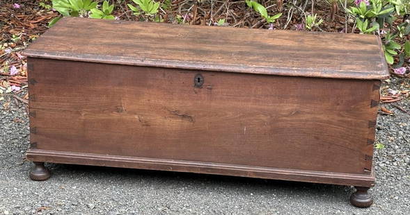 Delaware Valley Walnut Bun Footed Blanket Chest: lift top with interior till, late 18th century. 18" high, 45"wide, 19" deep. Expected age and use wear. Property from the Estate of Bobbie Hainline Howrey.