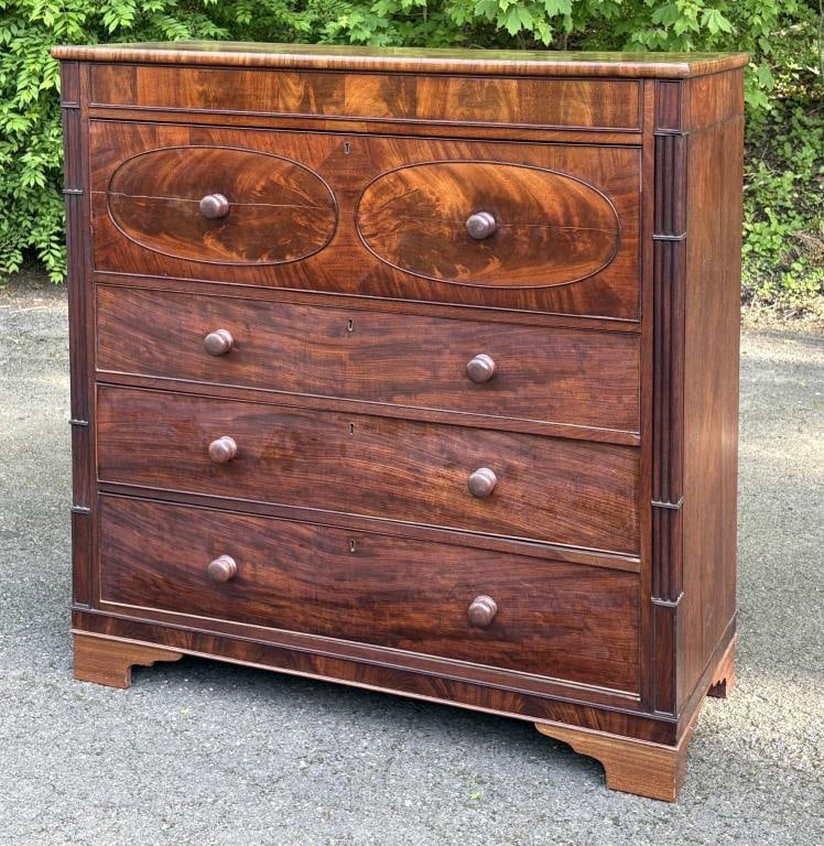Scottish George III Inlaid Mahogany Butler Desk: with superbly figured rich mahogany grained veneers, oval inset panels on desk drawer, fitted interior with multiple secret compartments and bone handles, four graduated drawers below; 51" high, 51" w