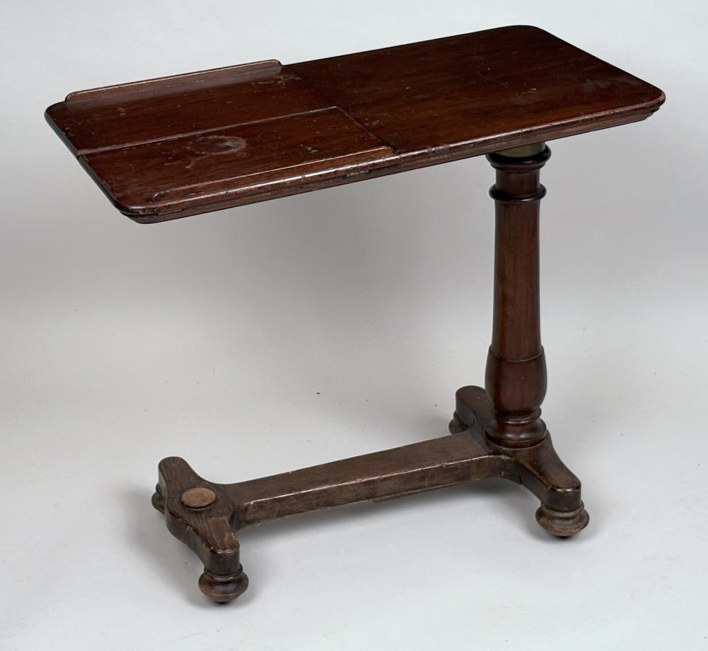 English Regency Bedside Cantilevered Writing Table: adjustable with two ratcheting book supports. 29" high, 32" wide, 16 1/2" deep. Some wear, scuffing; adjustment rod stuck.