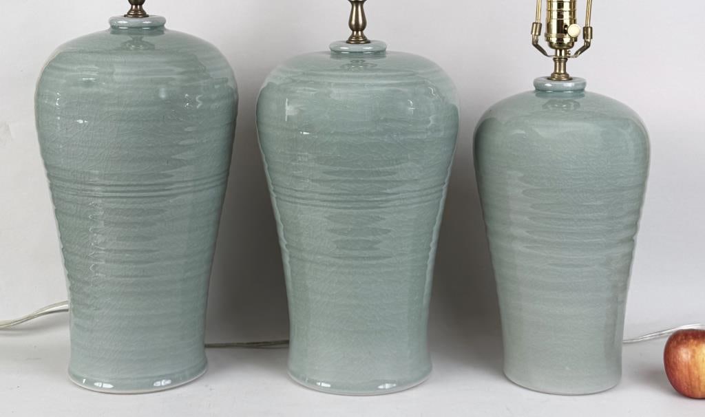 Three Baluster Form Celadon Tone Vases: as lamps. Largest: 29" high 9 1/2" diameter; porcelain approximately 16 1/2" high.