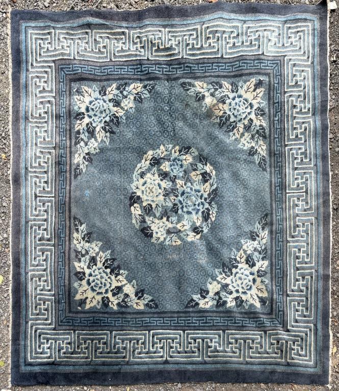Chinese Blue & White Carpet: close to square. 5' 8" by 6' 5". Stains, wear, a couple patches as shown. All rugs sold as is. Property from the Estate of Bobbie Hainline Howrey.