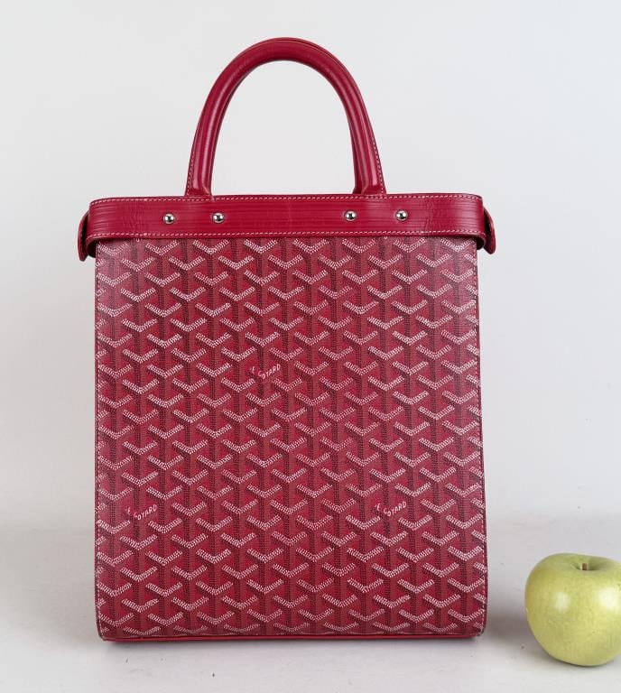 Goyard Jersey GM Handbag: Goyardine pattern. 13" high (17" w/ handle), 11" wide, 6" deep. Light use wear. Property from the Estate of Bobbie Hainline Howrey.
