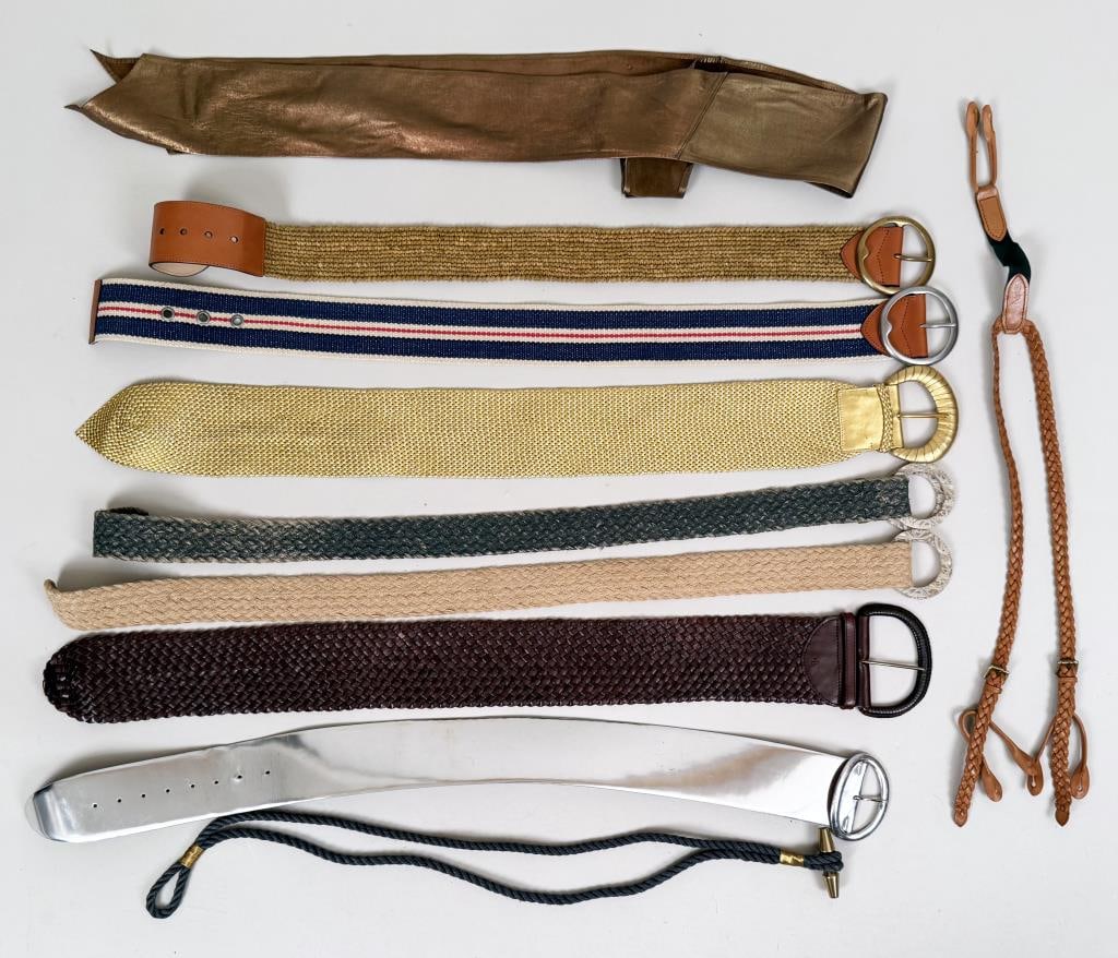 Group Eight Ralph Lauren Belts: along with one Ungaro copper wrap; two with carved horn buckles, one pair suspenders. Marked sizes mostly Small. Longest: 41" long 1 3/4" wide. Used, as found condition, wear. Property from the Estate