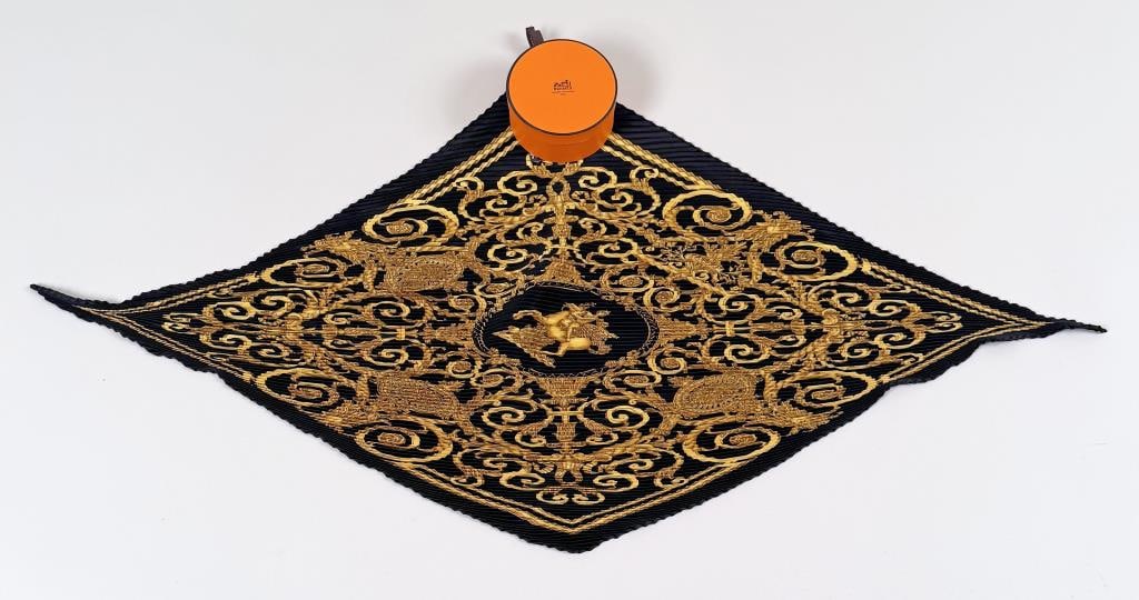 Hermes Plisse Scarf "Les Tuleries": in round box. Approximately 42" high, 53" wide. Wear to box. Property from the Estate of Bobbie Hainline Howrey.