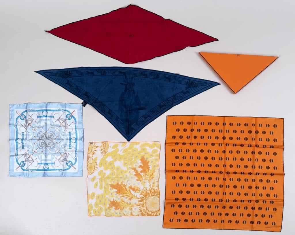 Group Five Hermes Scarves: comprising two neckerchiefs including Pani Lasher Pawnee, Hermes Paris; Fleurs et Carines II and Eperon D'or handkerchiefs, and geometric design in orange. Geometric: 25 3/4" high, 26 1/4" wide. Stain