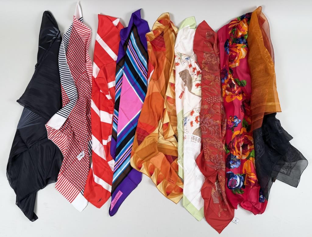 Group Eight Mostly YSL Silk Scarves: also includes Loewe and Yves Delorme. Largest 52 1/2" high, 52" wide. Varying levels of use wear, staining. Property from the Estate of Bobbie Hainline Howrey.