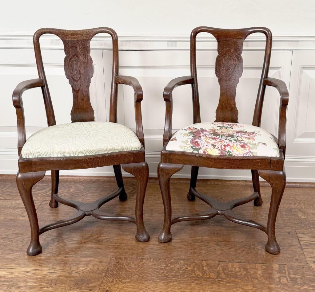 Pair English Oak Queen Anne Arm Chairs: 36 1/2" high, 21" wide, 17" deep; seat height: 17 1/2". Age and use wear, differing upholstery.