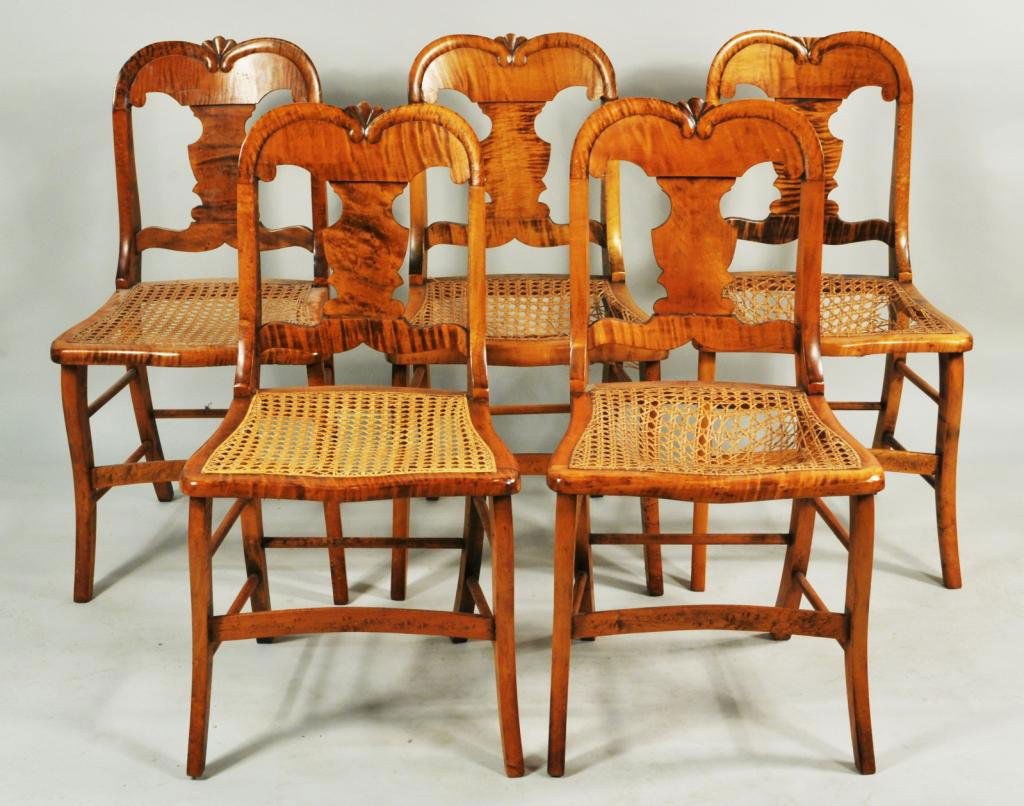 Set Five Classical Caned Tiger Maple Side Chairs: Set of five Classical, caned tiger maple side chairs, with carved crests, shaped splats and caned seats, 19th C. Each 32 1/2" high, 17 1/4" wide, 16 1/2" deep