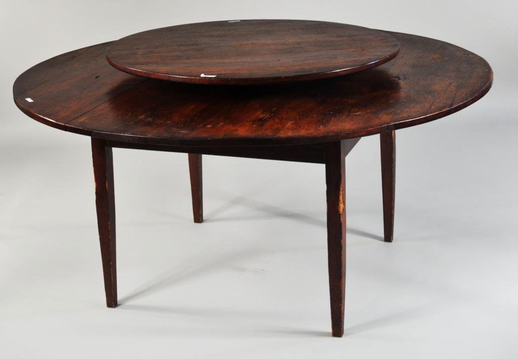 Hepplewhite Style Pine Lazy Susan Table: Hepplewhite style pine "Lazy Susan" table, with central spinning platform atop a circular table on square tapering legs. Late 19th or early 20th century. 31" high, 59 1/2" diameter.