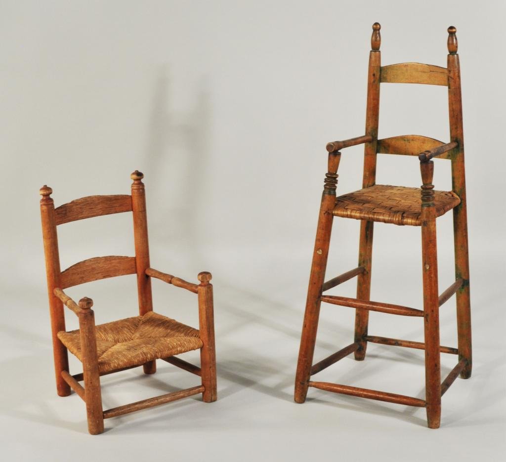 Two Ladder Back Child's Chairs: Two ladder back child's chairs, the first, a high chair with turned arm supports and remnants of green paint, the other, with turned arms and finials, 19th C. Large: 37" high, 15" wide, 13 1/2" deep; 