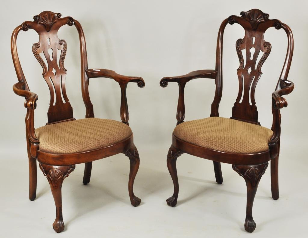 Pair Henredon Queen Anne Philadelphia Arm Chairs: Pair of Henredon Queen Anne style Philadelphia arm chairs, with shell carved crests and knees, pierced splats and trifid feet, 20th C. Each 43 1/2" high, 30 1/2" wide, 23 1/2" deep.