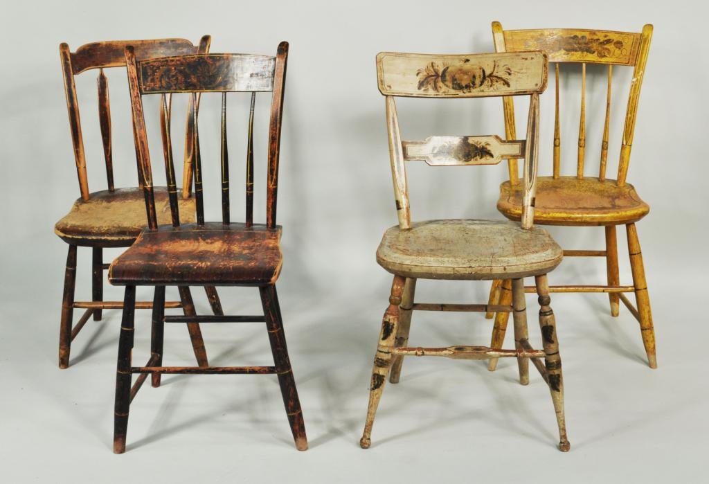 Four Painted Windsor Side Chairs: Four painted Windsor side chairs, comprising two black, one white and one yellow painted chair, each with stencil decoration, mid to late 19th C. Each approximately: 33" high, 16 3/4" wide, 17" deep.