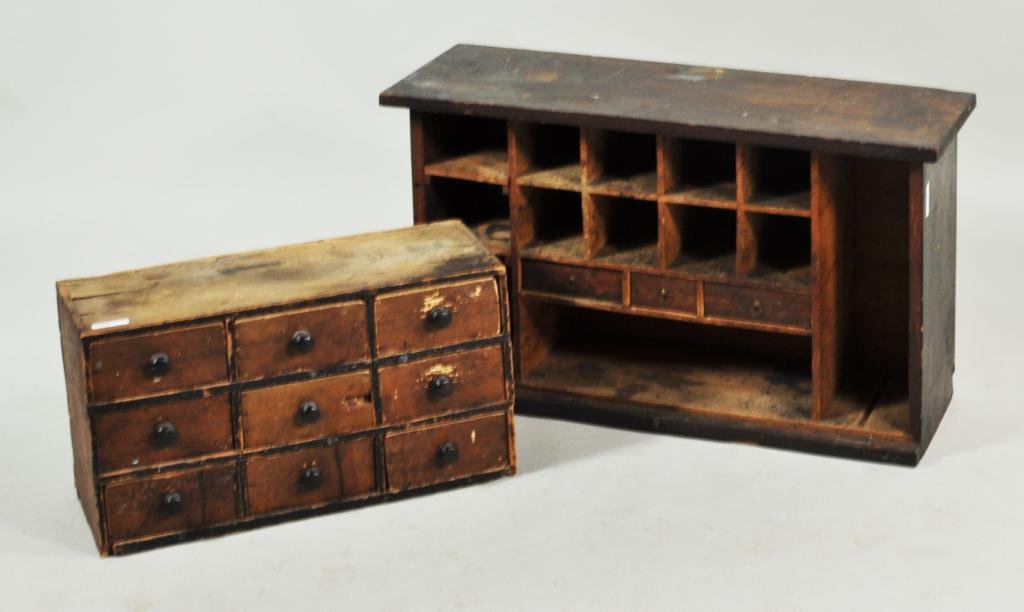 Small Apothecary and Desktop: Small apothecary, with nine drawers, together with a small desktop, 19th C. Largest: 18 1/4" high, 30 1/2" wide, 11" deep; smallest: 12" high, 21 1/2" wide, 7 3/4" deep.