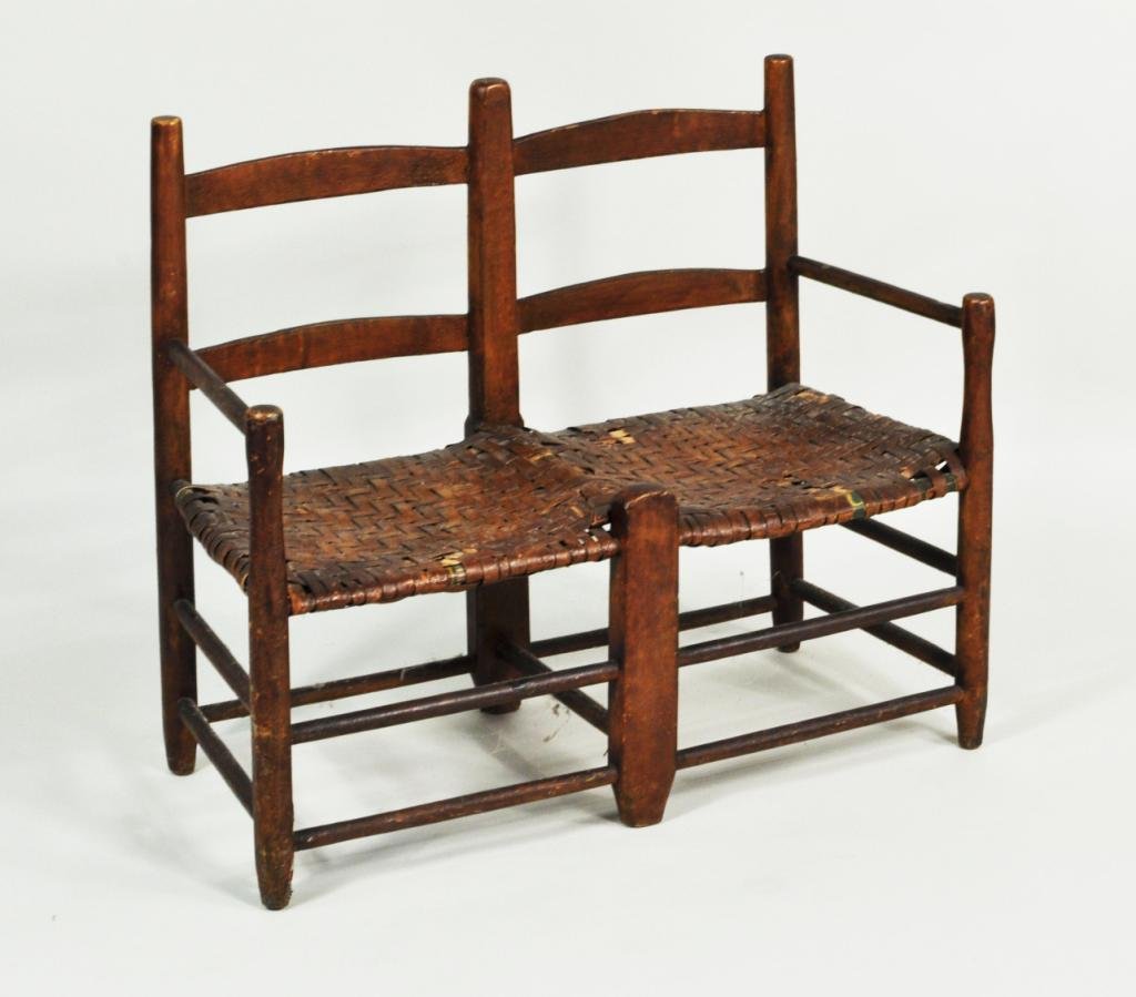 Child's Ladderback Settee: Child's ladderback settee, with turned stretchers and cane woven seat, 19th C. 28 1/2" high, 33" wide, 15" deep.