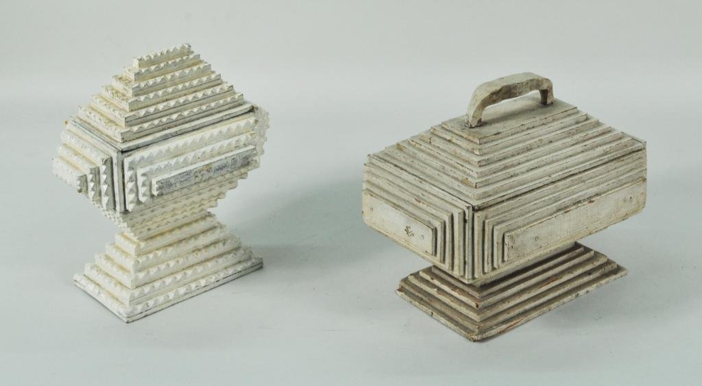 Two White Painted Tramp Art Boxes: Two white painted tramp art boxes, c. 1900, of stepped pedestal form, constructed from Cuban cigar boxes. 8 1/2" high, 7 1/2" wide; 7" high, 9 1/2" wide. Condition: soiling, paint wear, loss, larger w