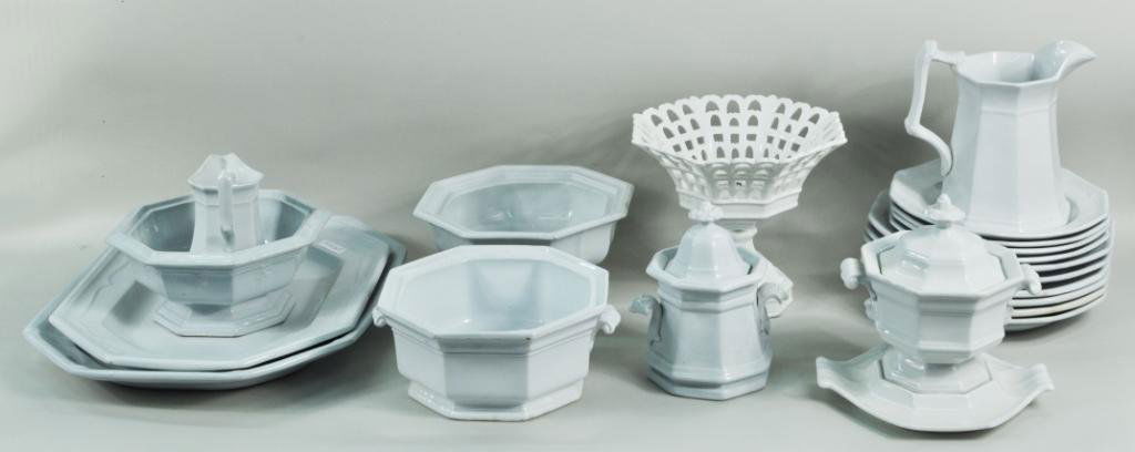 Group English Ironstone China: Group of English ironstone china, 19th C., including two platters, a pitcher, gravy boat on stand, ten plates in two sizes, a compote and other items. Largest: 17 1/2" high, 13 1/2" wide; smallest: 5