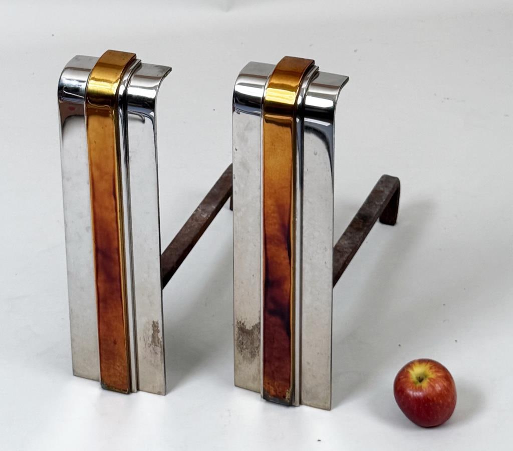 Pair Karl Springer MCM Nickel & Brass Andirons: 18 3/4" high, 5 1/2" wide, 20 1/2" deep. Oxidation, age and use wear, soot.