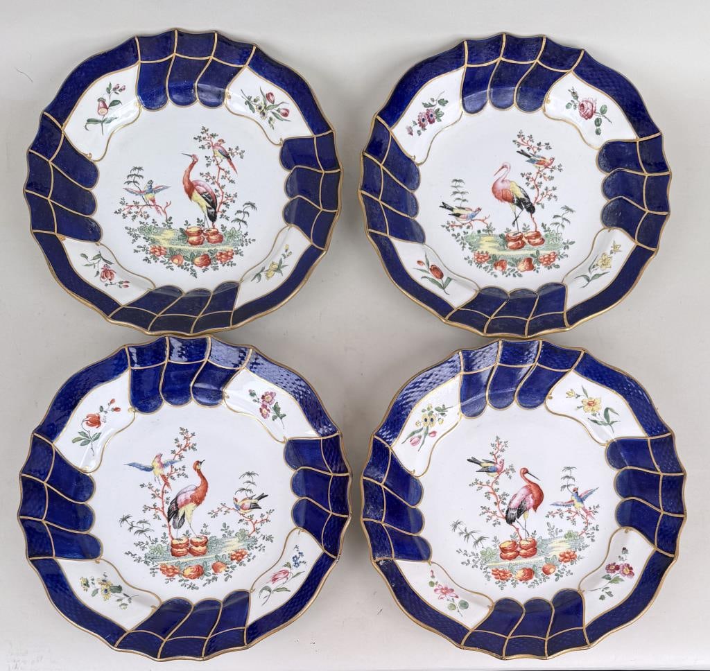 Four Tournai Painted Porcelain Plates: with cobalt border and Chelsea style bird motif. 9 3/4" diameter. Light paint wear, soiling.