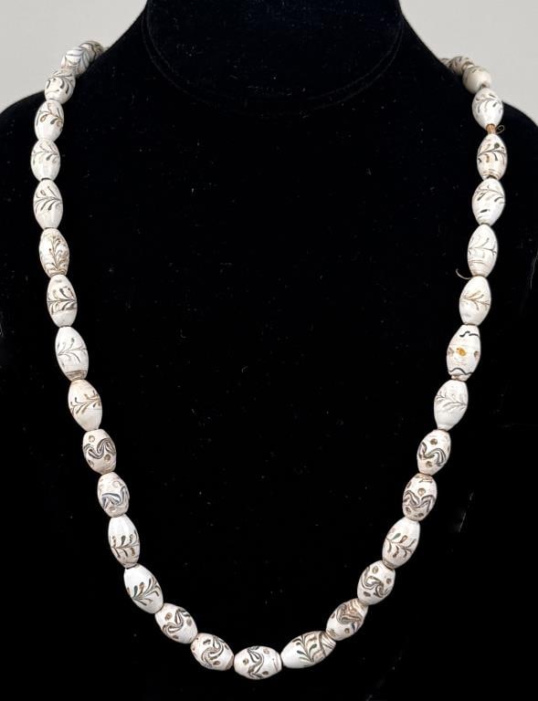 African Glass Bead Necklace: Approximately 27" long.